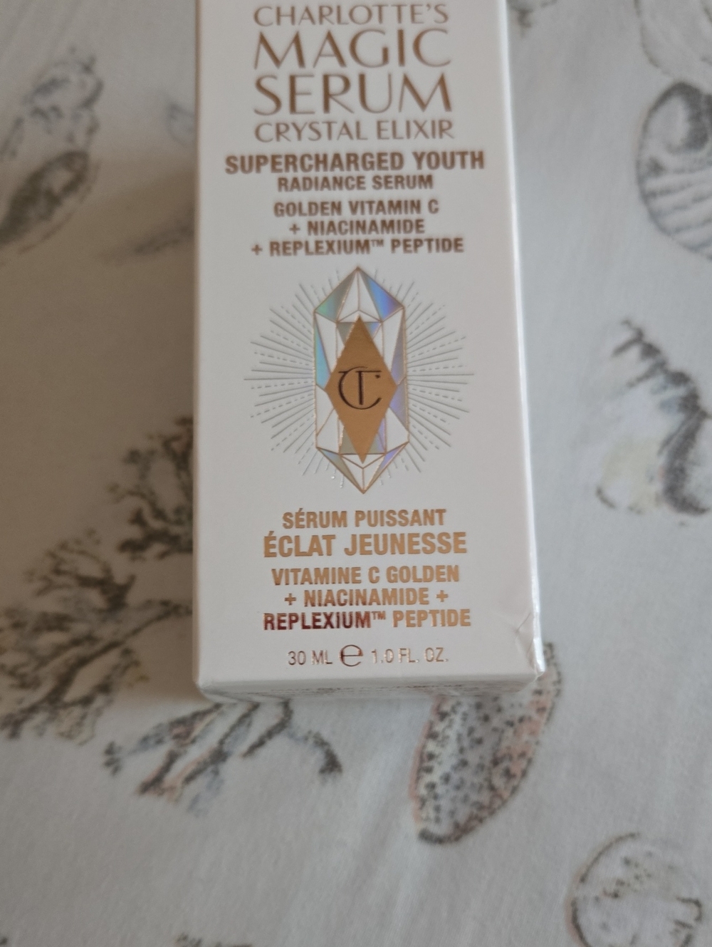 Charlotte Tilbury Golden & White Radiance Serum Packaging